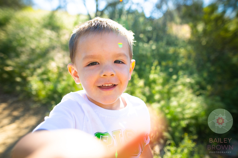 Spring photography of children enjoying a nature habitat.